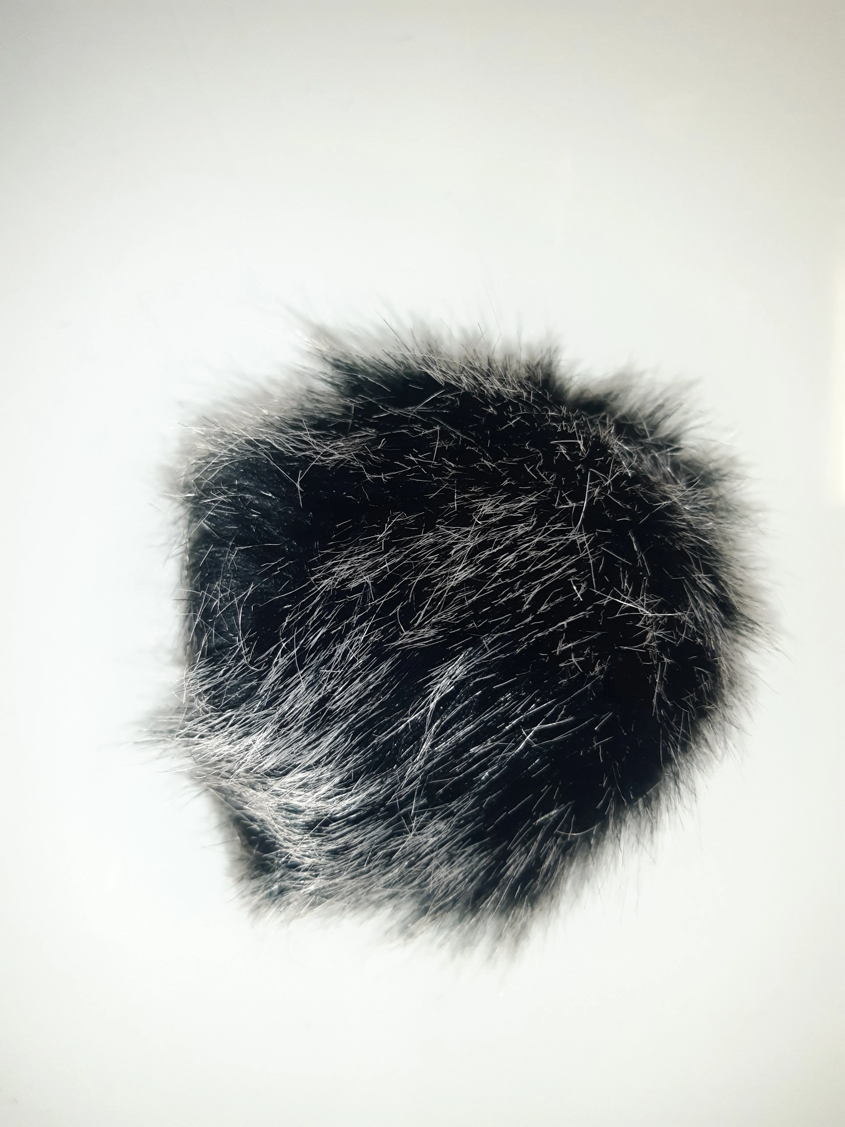 3 Surprise Pom Poms (Hats Sold Separately)
