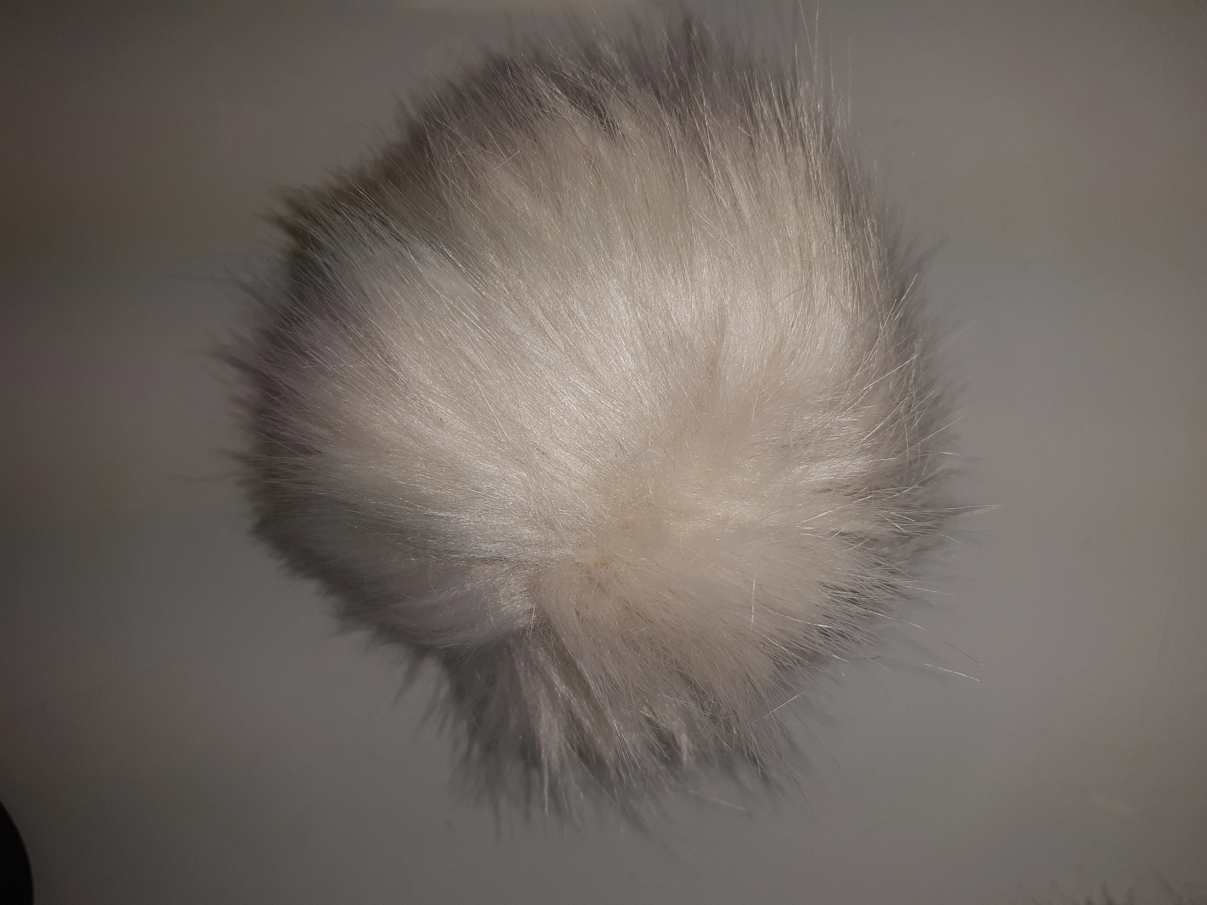 3 Surprise Pom Poms (Hats Sold Separately)