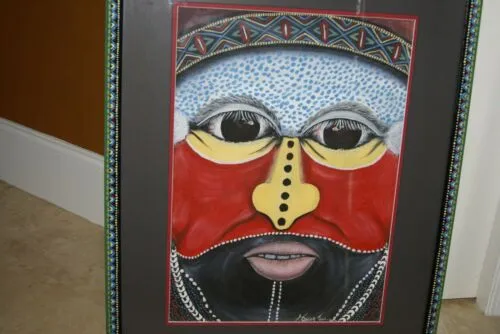 RARE UNIQUE AUTHENTIC COLORFUL FOLK ART PAINTING TRIBAL WARRIOR FROM PAPUA NEW GUINEA ARTIST FRAMED IN SIGNED HAND PAINTED FRAME TO MATCH THE ART WITHIN 29 1/4” X 23 3/4” DFP7 DESIGNER COLLECTOR WALL ART