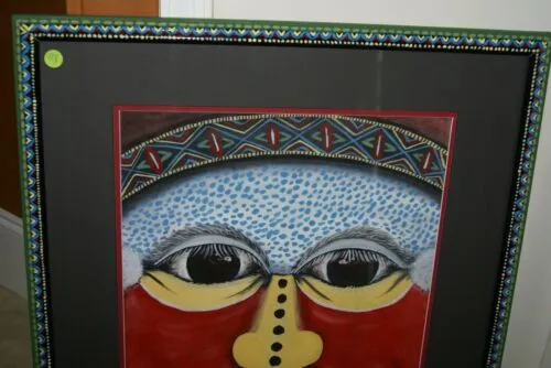 RARE UNIQUE AUTHENTIC COLORFUL FOLK ART PAINTING TRIBAL WARRIOR FROM PAPUA NEW GUINEA ARTIST FRAMED IN SIGNED HAND PAINTED FRAME TO MATCH THE ART WITHIN 29 1/4” X 23 3/4” DFP7 DESIGNER COLLECTOR WALL ART
