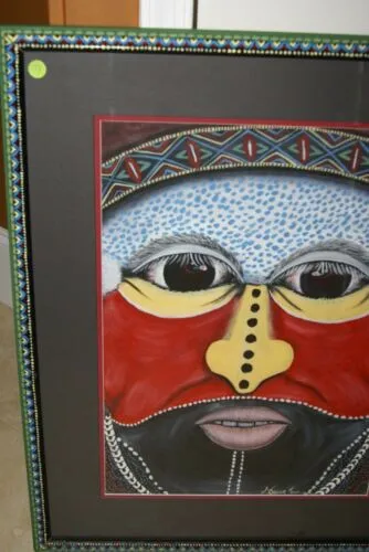 RARE UNIQUE AUTHENTIC COLORFUL FOLK ART PAINTING TRIBAL WARRIOR FROM PAPUA NEW GUINEA ARTIST FRAMED IN SIGNED HAND PAINTED FRAME TO MATCH THE ART WITHIN 29 1/4” X 23 3/4” DFP7 DESIGNER COLLECTOR WALL ART
